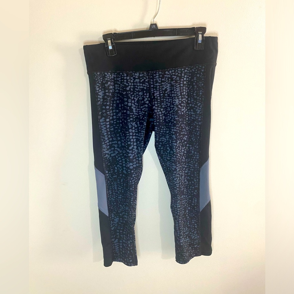 Champion Large capri legging in black with grey accent.